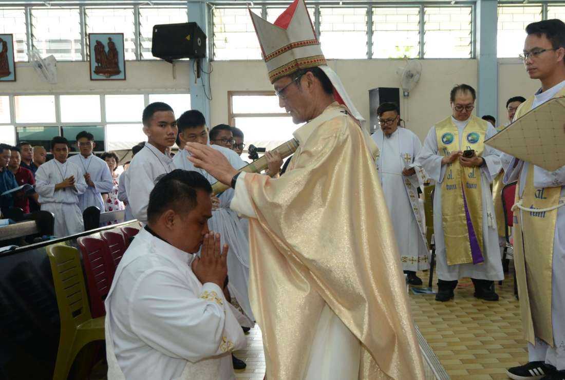 Archbishop John Wong of Kota Kinabalu, Malaysia ordains Bradley Stephen Belly, the first priest from ethnic Rungus community on Nov. 8.