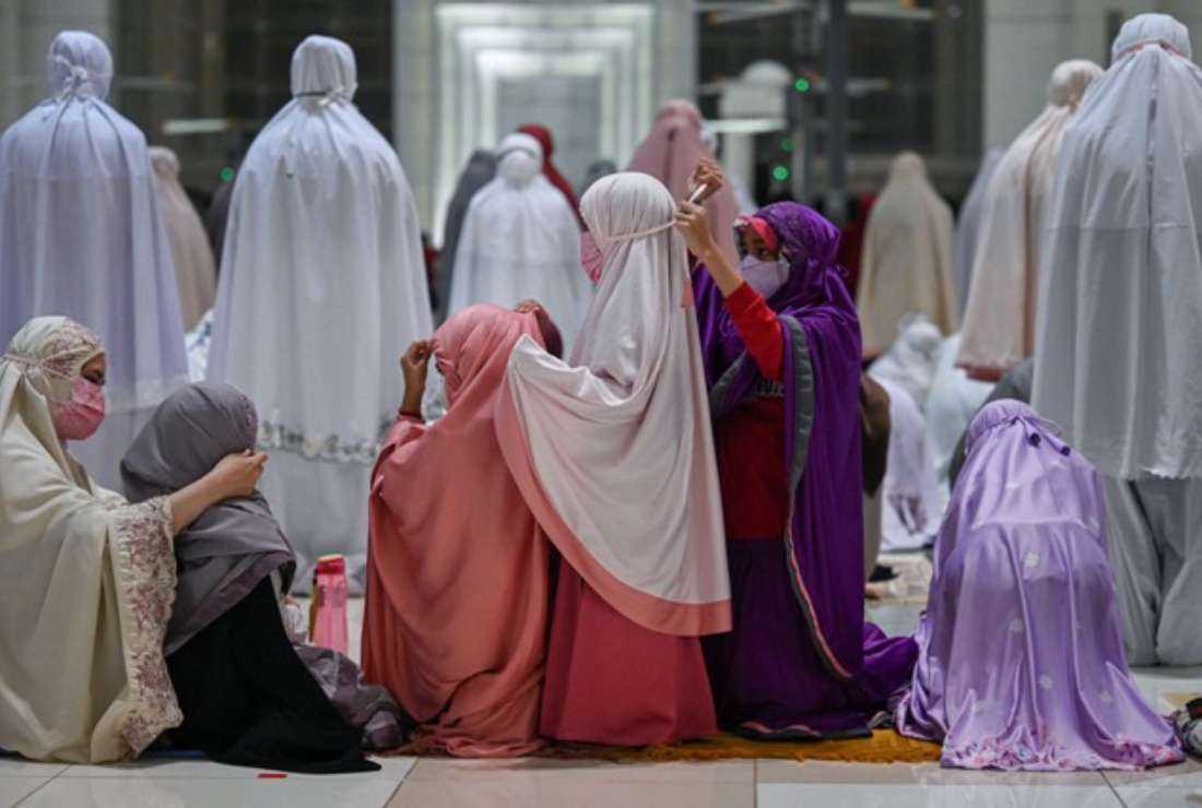 Muslim children attend the first evening prayer marking the start of Islam's holy month of Ramadan at the Tuanku Mizan Zainal Abidin mosque in Putrajaya, Malaysia, on April 2, 2022.