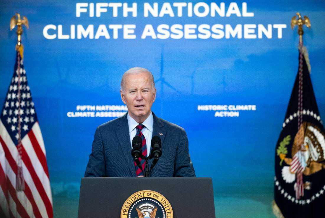  US President Joe Biden delivers remarks on his Administration’s actions to address the climate crisis in the South Court Auditorium of the White House in Washington, DC, on Nov. 14.