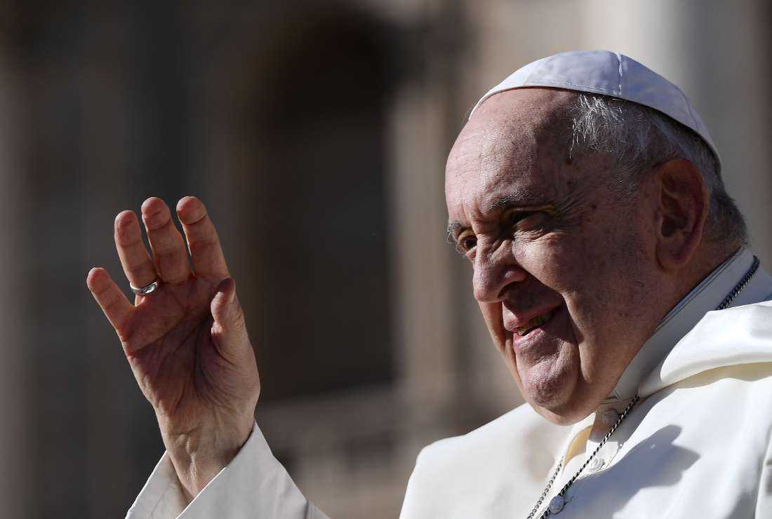 Pope Francis waves to the crowd during the weekly general audience on Nov. 8 at St Peter's square in The Vatican.