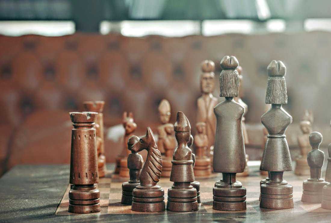 Chess pieces are seen randomly placed