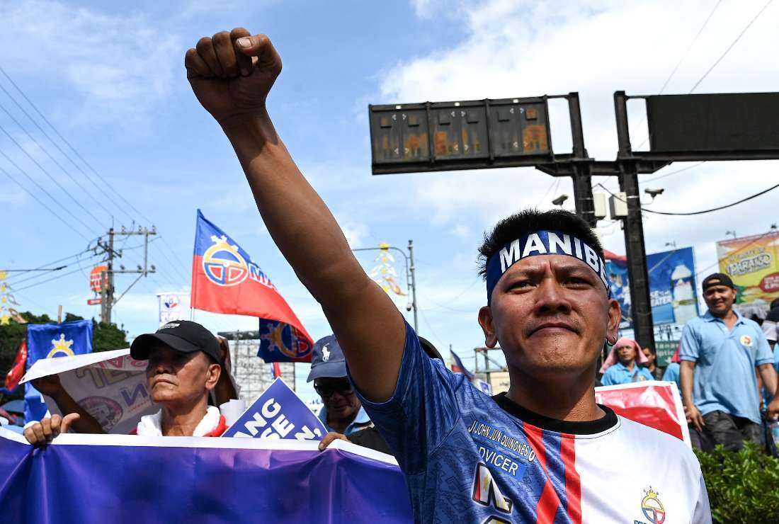 A jeepney driver takes part in a protest against the public utility vehicles modernization plan in Manila on Jan 16.