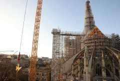 Carpenters hail end of Notre Dame roof reconstruction