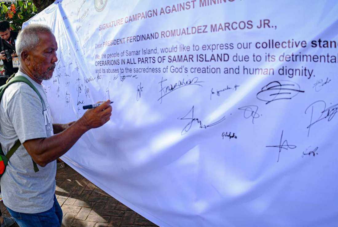 A signature campaign against mining operations in Eastern Samar province in progress on Jan. 20. 