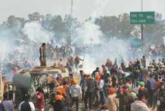 Protesting Indian farmers stalled but defiant