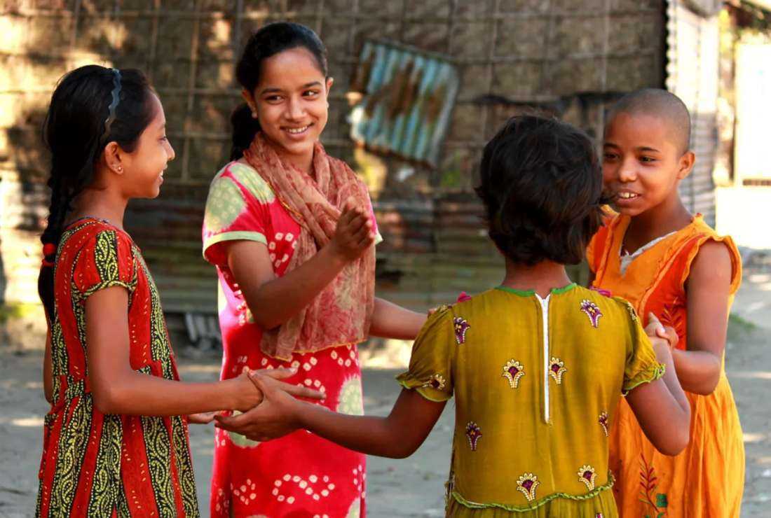 Shimu (second from left) was rescued from hazardous child labor in Bangladeshi thanks to support by a charity group. She is seen playing with other children in this undated image.