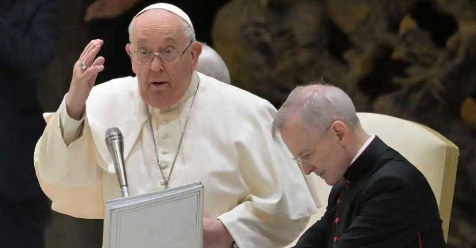 Pope Francis gestures during his weekly general audience on Feb 14 in the Vatican's Paul-VI Hall. 