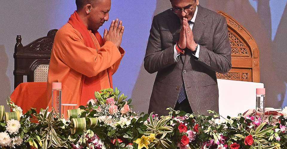 Chief Minister Yogi Adityanath (left) and Chief Justice of India Justice Dhananjaya Y Chandrachud during the inauguration of a law university in Uttar Pradesh on Feb. 16. The monk-turned-politician enacted the draconian anti-conversion law in 2020.