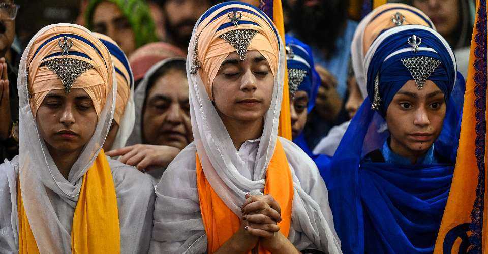Sikh pilgrims pray in Pakistan’s Gurdwara Panja Sahib on April 14, 2023. Pakistan does not have an institution with legal powers to ensure the rights of religious minorities.