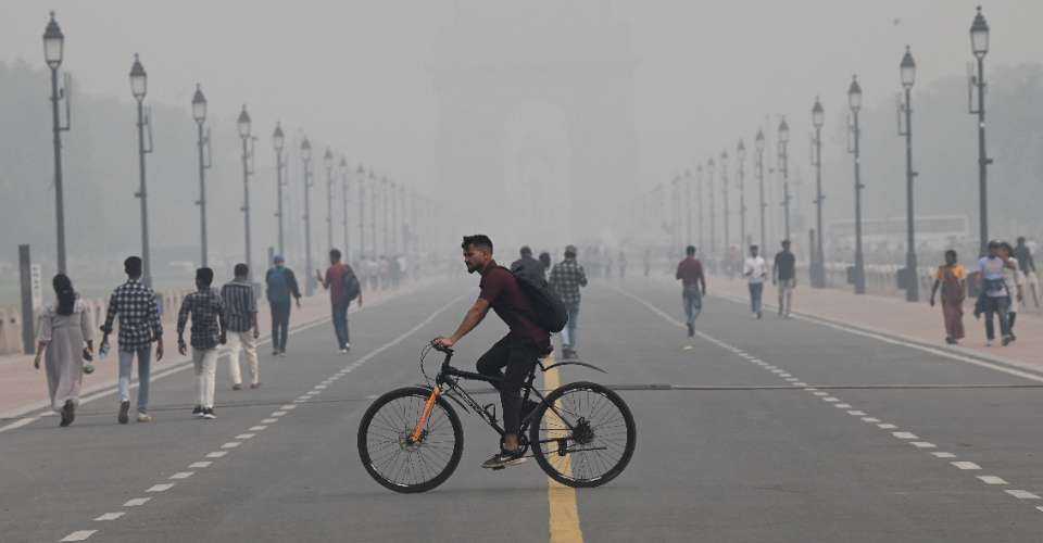 People walk amid heavy smog conditions in New Delhi on Nov. 3, 2023. India’s national capital was ranked as the city having the worst air quality at a global level.