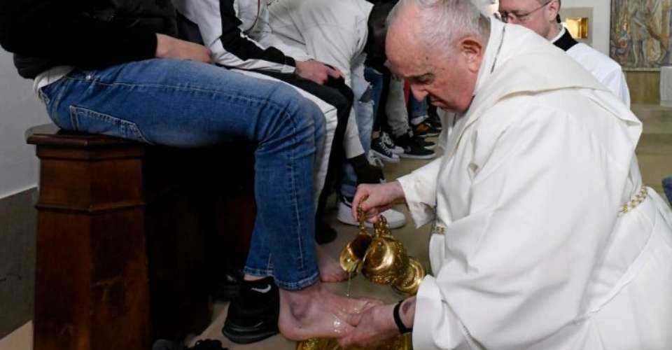 Pope Francis washes the feet of young women at the Mass of the Lord's Supper in 2023.
