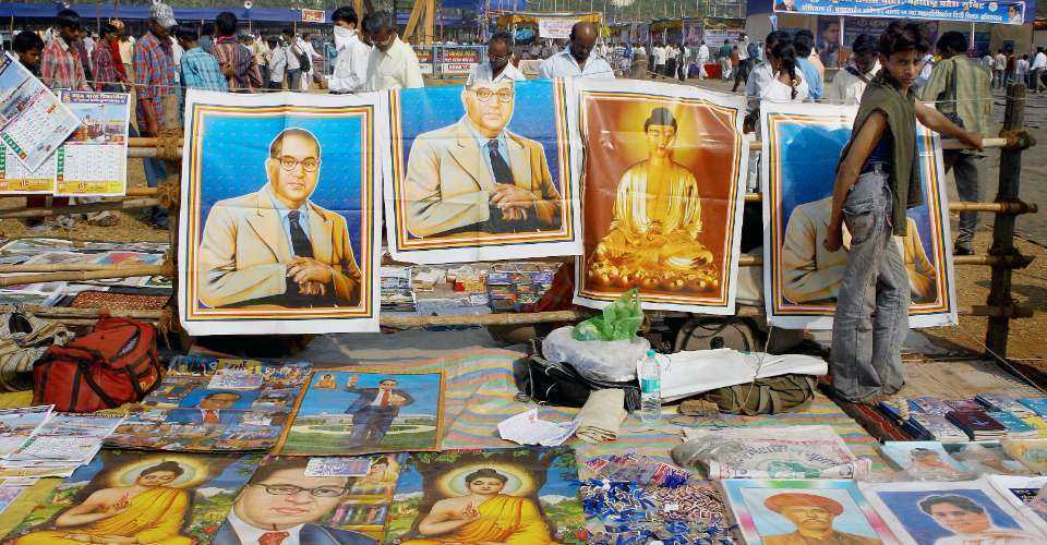 A vendor sells pictures of the Buddha and Dalit leader Dr. Babasaheb Ambedkar on his 50th death anniversary in Mumbai on Dec. 6, 2006. Ambedkar regarded Buddhism as a revolution, calling it 'as great a revolution as the French Revolution.' 