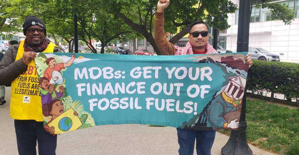 Lawyer Aaron Pedrosa from the Philippines takes part in a protest to urge the World Bank to stop financing fossil fuel projects in Asian nations in Washington on April 19.
