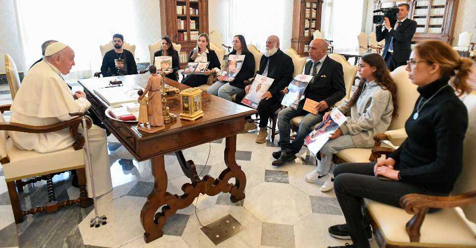 This photo taken and handout on April 8 by The Vatican Media shows Pope Francis during a meeting with relatives of Israeli hostages held in Gaza since Oct. 7 attacks by Hamas militants.