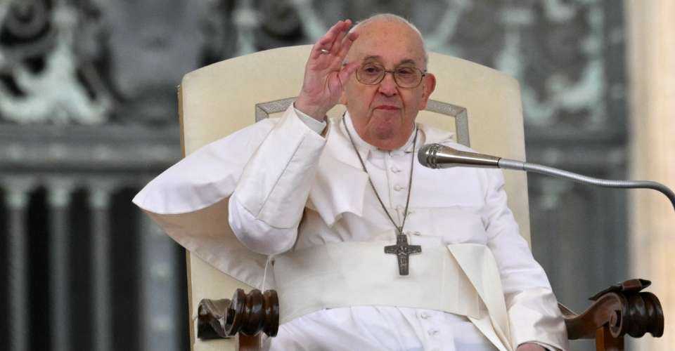 Pope Francis waves to the crowd during the weekly general audience on April 10 at St Peter's square in The Vatican