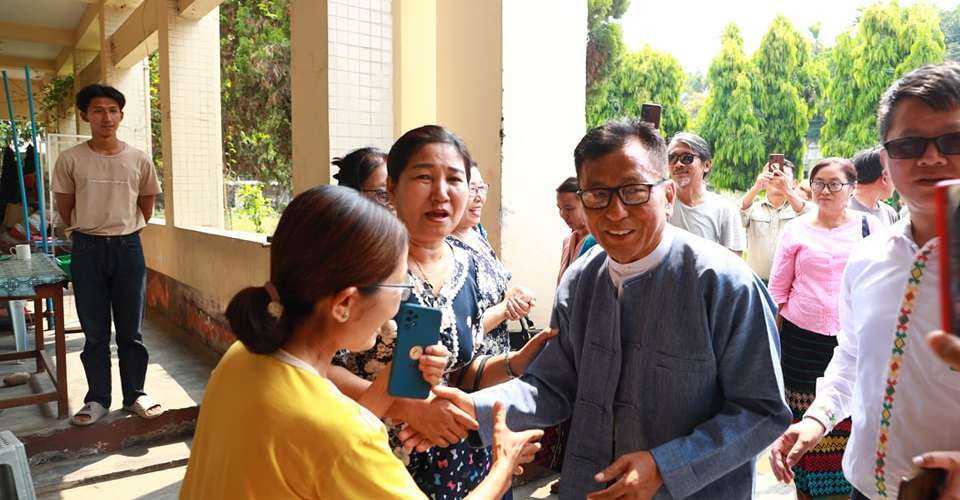 Family members greet prominent ethnic Kachin Baptist leader Dr. Hkalam Samson after he was released from a prison in the Kachin state capital Myitkyina in northern Myanmar on April 17.