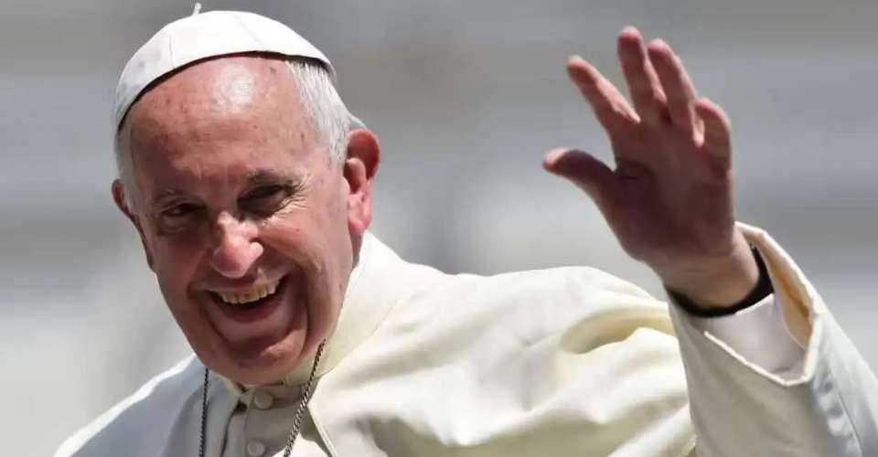 Pope Francis waves to people in this undated image.