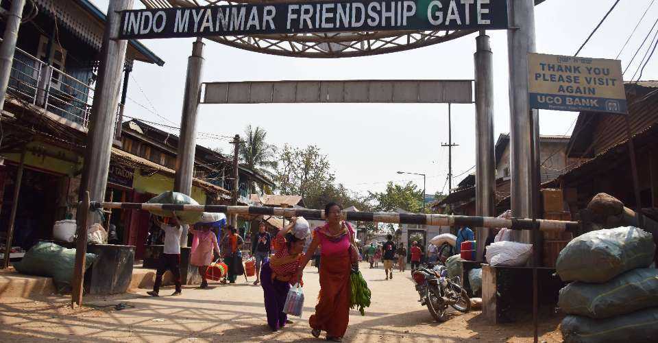 People carrying goods from Myanmar enter India through the Indo-Myanmar Friendship Gate in Manipur.