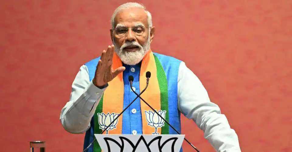 India's Prime Minister Narendra Modi speaks after releasing the Bharatiya Janata Party's (BJP) manifesto ahead of the country's upcoming general elections, at the party headquarters in New Delhi on April 14. 