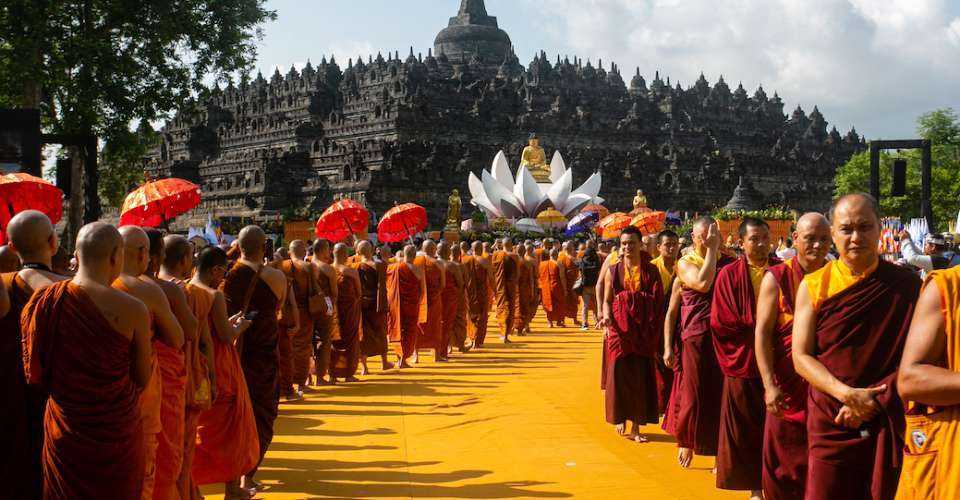 Buddhist monks attend a parade to celebrate Vesak Day at the Borobudur temple in Magelang on June 4, 2023.