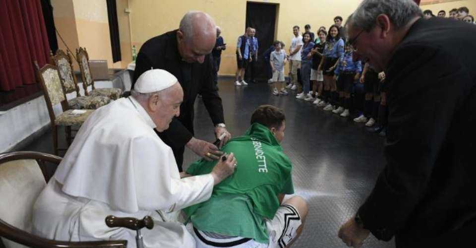 Pope Francis meets young Catholics at Rome's Parish of Saint Bernadette di Soubirous.