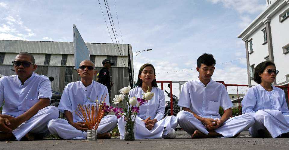 Activists protest a crackdown on Cambodian environmental activists and block a street to the municipal court in Phnom Penh on June 5.