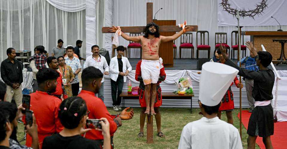 Christians enact the crucifixion of Jesus Christ to mark Good Friday at Sacred Heart Cathedral in New Delhi on March 29.