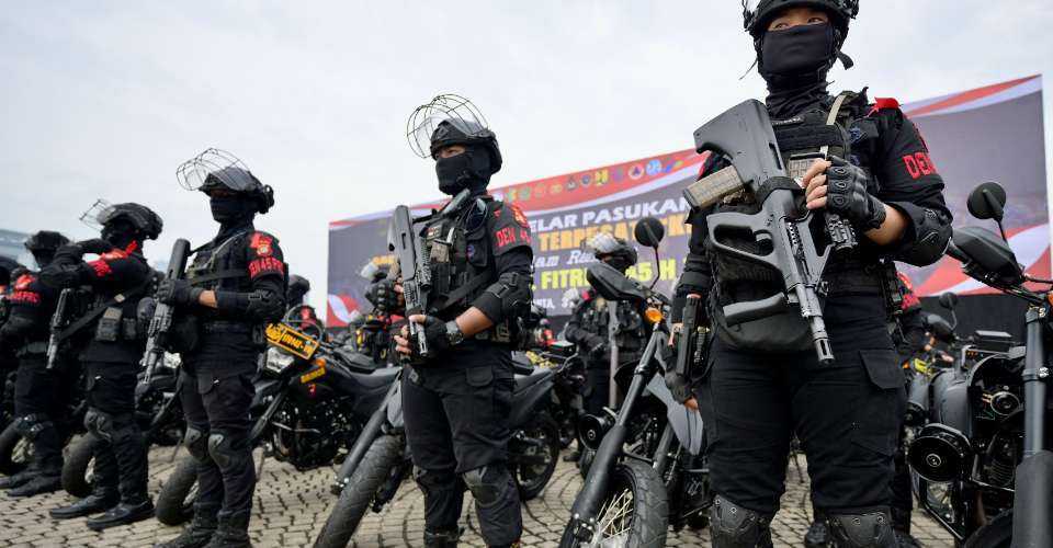 Indonesian police special force personnel attend a roll call in Jakarta on April 3 as part of their effort to secure the upcoming Eid al-Fitr celebration next week, where Muslims utilize the extended holiday to reunite with their families in their respective hometowns.