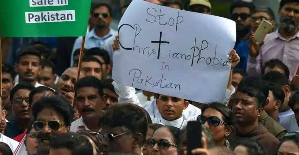 Civil society activists and members of the Christian community hold placards as they take part in a protest to condemn the attacks on churches in Pakistan, in Karachi on Aug. 18, 2023.