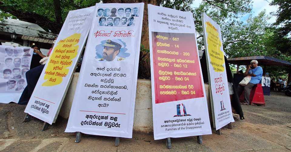 Banners protesting the impending release of former navy chief Admiral Wasantha Karannagoda are seen in the Sri Lankan capital Colombo on June 24.