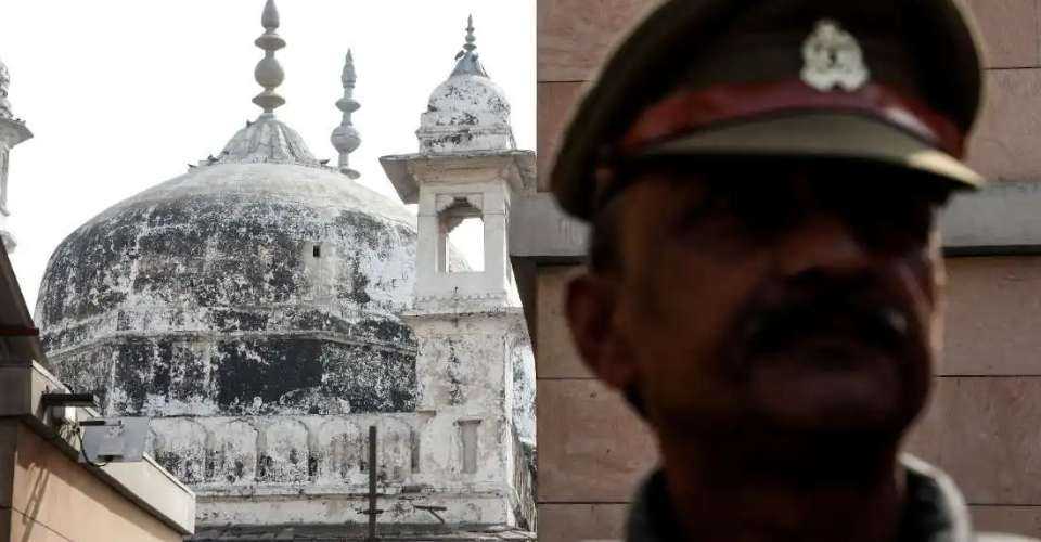 An Indian policeman stands guard near Gyanvapi mosque in Varanasi city on Feb. 1, hours after a court order gave Hindu worshippers the go-ahead to pray at the disputed site.