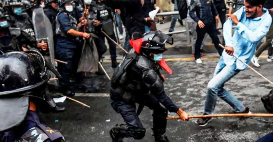 Student activists clash with police during a protest over a hike in fuel prices in Kathmandu, Nepal, on June 20, 2022.