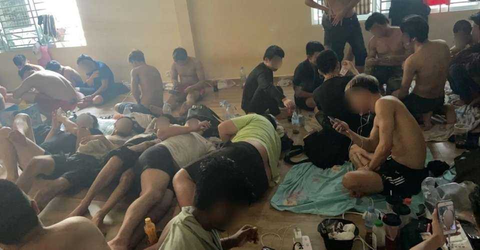 Foreign nationals detained inside an immigration detention center in Cambodia in this undated picture.