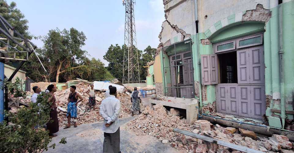Muslim clerics and residents are seen inside the quake-hit Shwe Phone Shein mosque in Mandalay, Myanmar, in late April.
