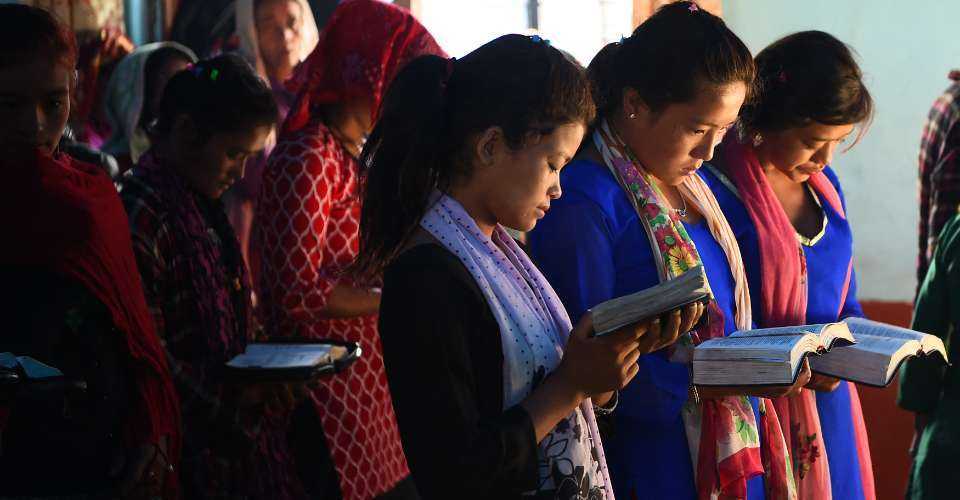 In this photograph taken on Oct. 8, 2017, Nepali Christians take part in a church service in Lapa village in Dhading, some 100 km northwest of Kathmandu.
