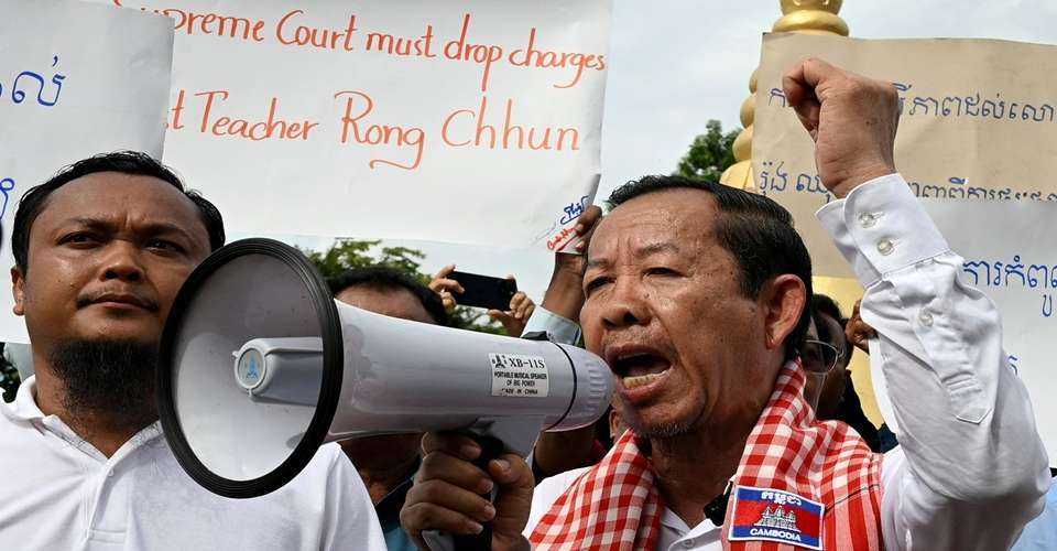 Cambodia court reduces jail term for opposition adviser