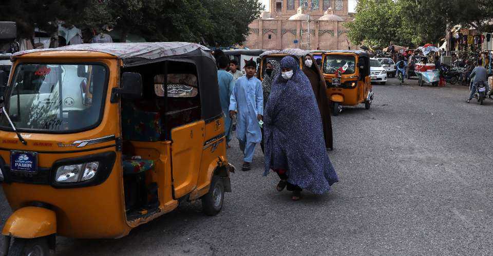 Afghan police disperse men staging rare protest for women's rights
